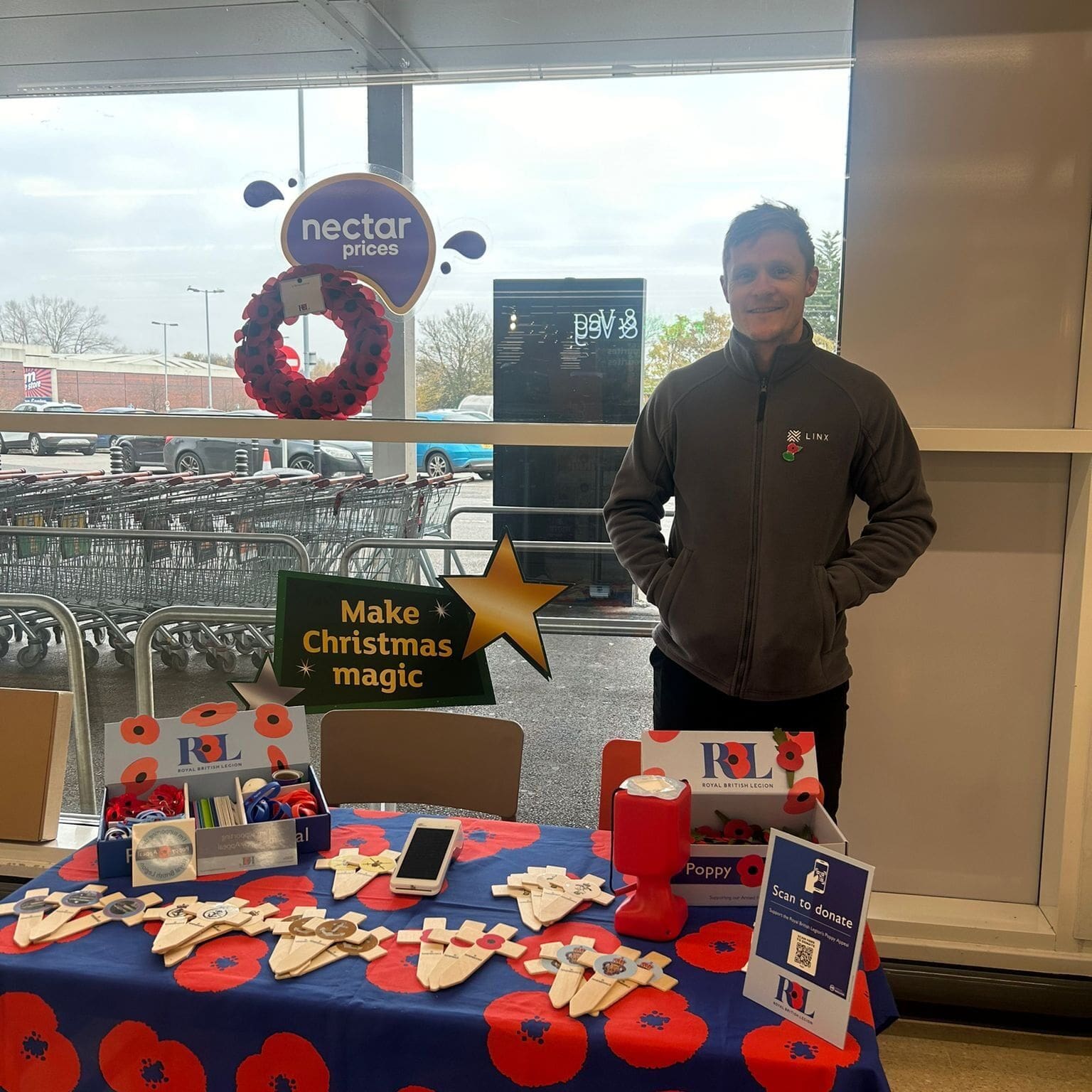 Ian Brown from Linx volunteering on the Poppy stand